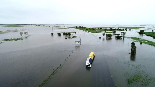 Drone images of flooding at Thompson's Creek on the Bruce Highway at Goorganga Plains looking north. Photos: Robert Murolo