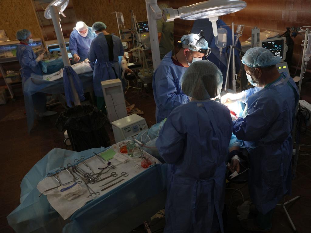 Doctors make a surgery for a civilian woman wounded in Russian shelling at a hospital in the eastern Ukrainian region of Donbas. Picture: AFP