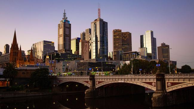 A quiet Melbourne city skyline during the COVID-19 pandemic, pictured at what would normally be a busy evening peak. Picture: Mark Stewart