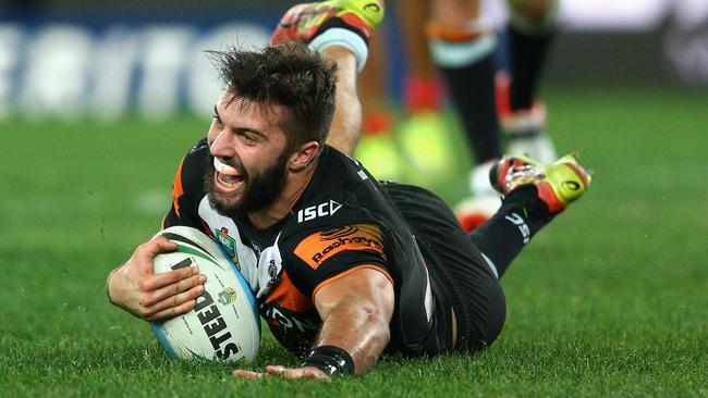 James Tedesco scores late against the Rabbitohs.