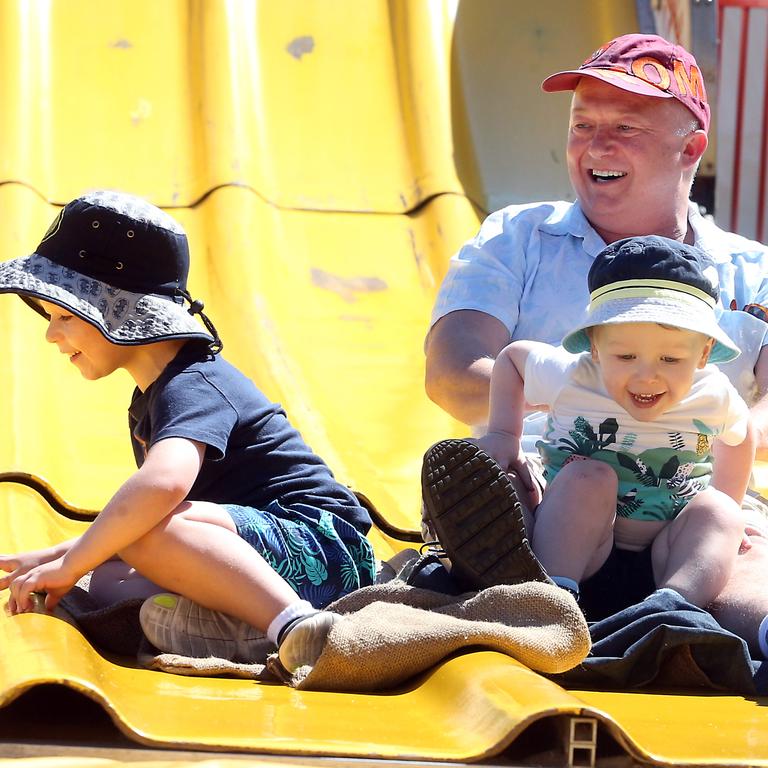 Hugo Buccheri, 4, takes on the slippery dip with Joseph Buccheri and Leo Buccheri, 2. Picture: Richard Gosling