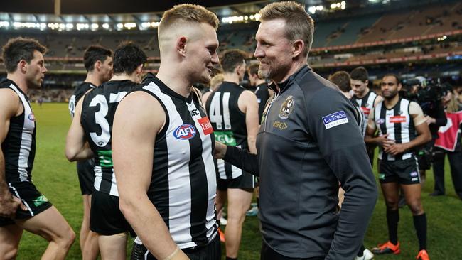 Buckley and Adam Treloar during happier times at Magpies training. Picture: AAP