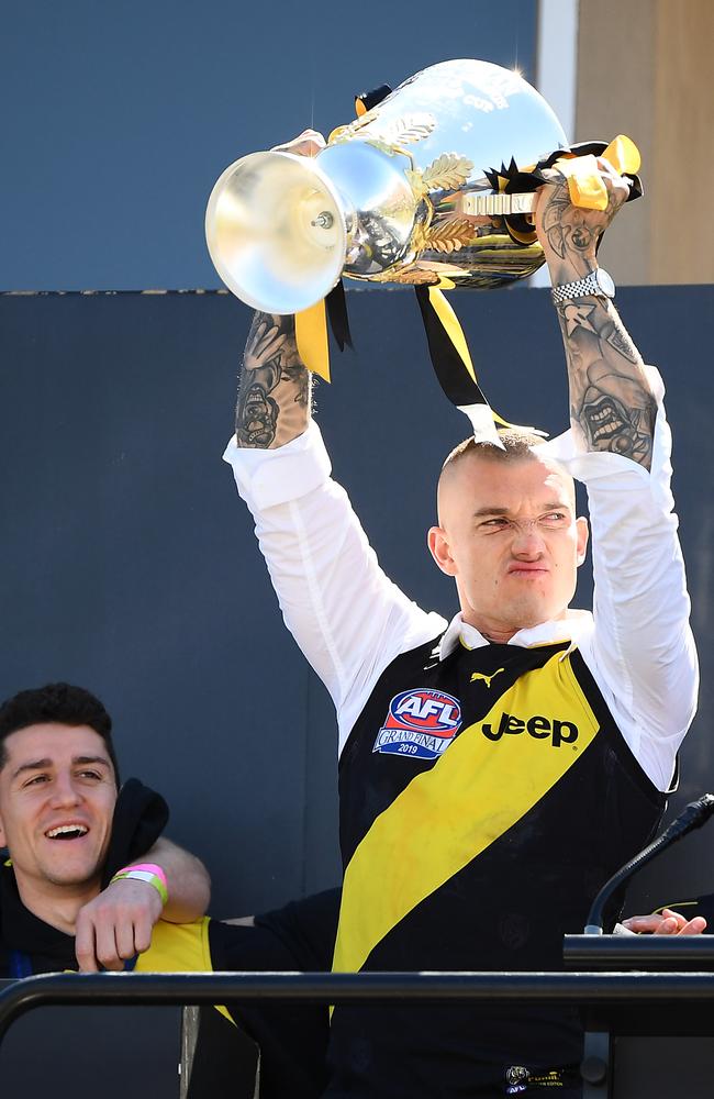 Bad boy gone good ... Dustin Martin shows off the Premiership Trophy to the crowd during the Richmond Tigers’ Grand Final Celebrations. Picture: Getty Images