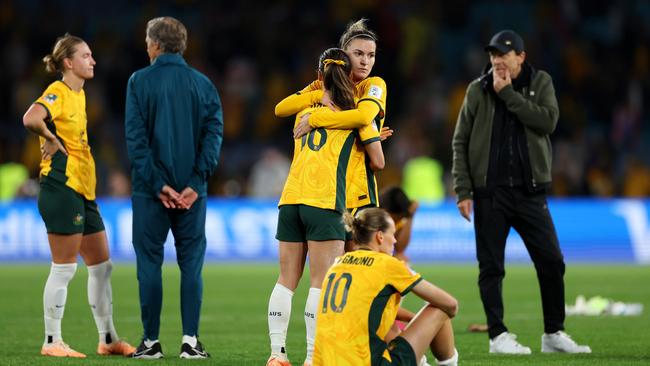 Hayley Raso is consoled by Steph Catley after the team’s defeat by England. Picture: Getty Images.