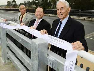 IPSWICH HISTORY: Great grandsons of James Ivory, Derek Nixon-Smith (right) and Rod Nixon-Smith (left) with developer Adam Shephard (centre) from Amex Corporation at the opening of the James Ivory Bridge in Providence, South Ripley. Picture: David Nielsen