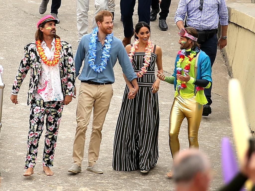Meghan and Harry on Bondi beach meeting the locals. Picture: John Grainger