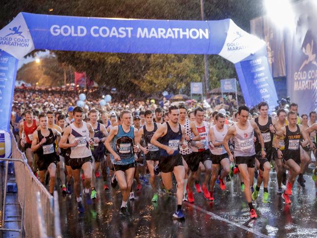 Elite competitors starting the Southern Cross University 10km Run in the wet. Picture: Tim Marsden