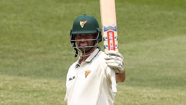 Tasmania’s Alex Doolan celebrates bringing up his double century at the MCG on Wednesday.