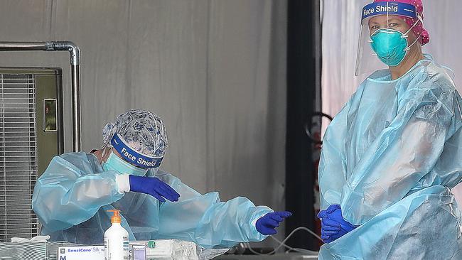 Testers at a rapid response testing site set up at Hallam Senior College. Picture: NCA NewsWire/Ian Currie