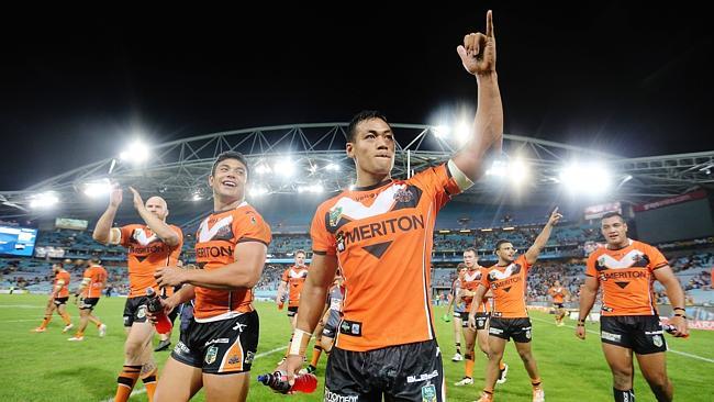 Wests Tigers celebrate their victory.