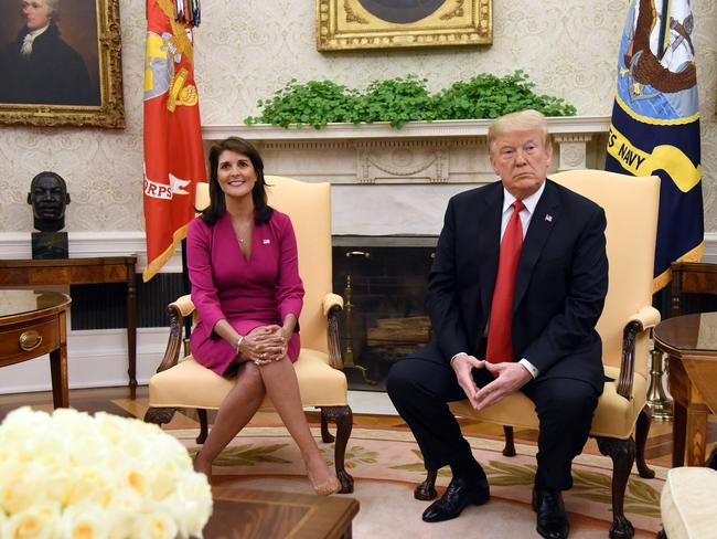 (FILES) US President Donald Trump meets with Nikki Haley, the United States Ambassador to the United Nations in the Oval office of the White House on October 9, 2018 in Washington, DC. Florida Governor Ron DeSantis suspended his campaign for the Republican presidential nomination on January 21, 2024, saying he would throw his support behind frontrunner Donald Trump. His withdrawal from the race comes less than two days before the New Hampshire primary, where polls showed him far behind ex-president Trump and former UN ambassador Nikki Haley. (Photo by Olivier Douliery / AFP)