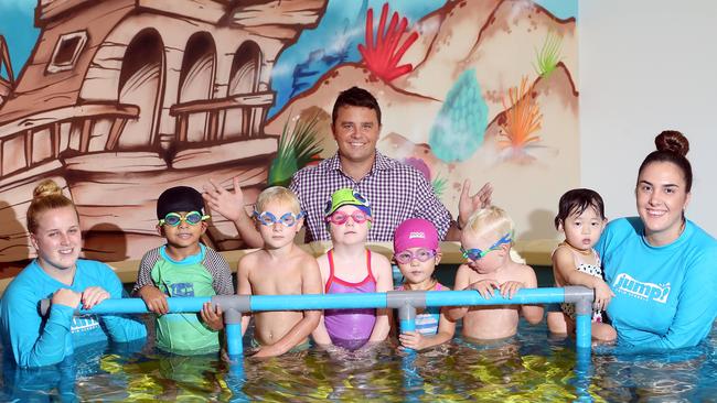 Gold Coast-based Jump! Swim Schools spread rapidly to 60 schools around Australia. Founder. Ian Campbell pictured at the Bundall facility with kids and teachers Sarah Schmith and Serena Proietto. Picture: Richard Gosling