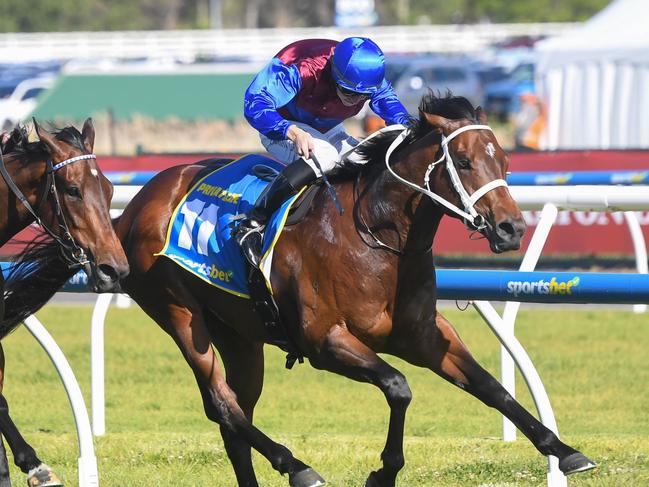 Private Life ridden by Damian Lane wins the Sportsbet Caulfield Guineas at Caulfield Racecourse on October 12, 2024 in Caulfield, Australia. (Photo by Pat Scala/Racing Photos via Getty Images)