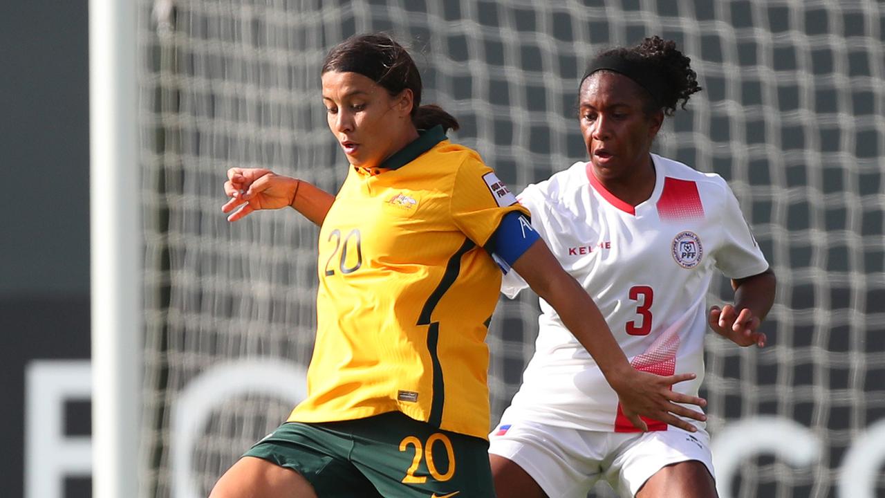 MUMBAI, INDIA - JANUARY 24: Sam Kerr of Australia controls the ball under pressure of Dominique Randle of the Philippines during the AFC Women's Asian Cup Group B match between Philippines and Australia at Mumbai Football Arena on January 24, 2022 in Mumbai, India. (Photo by Thananuwat Srirasant/Getty Images)