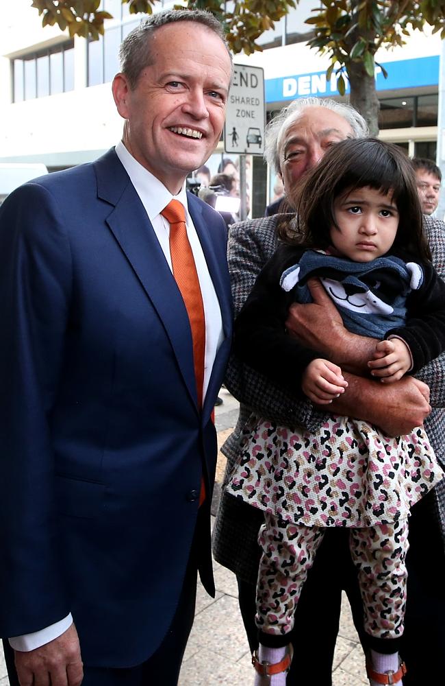 This little girl doesn’t look too pleased with her relative trying to get her in shot. Picture Kym Smith