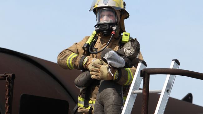 Aviation firefighter doing his Certificate 4 at the training grounds inside Sydney Airport. ARFF fightfighers handle fuel spills, hazmat, first aid in the terminal and aircraft and vehicle accidents within the airport and they must be reaccredited every 90 days.