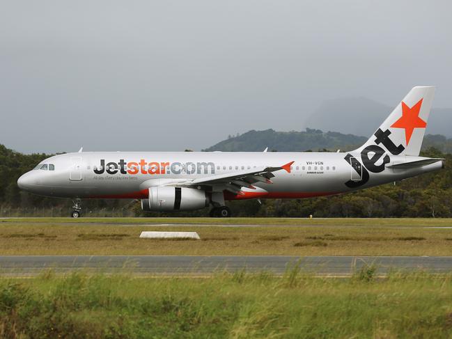 General, generic photos from the Gold Coast Airport. Jetstar plane touches down on the runway. Picture: Brendan Radke.