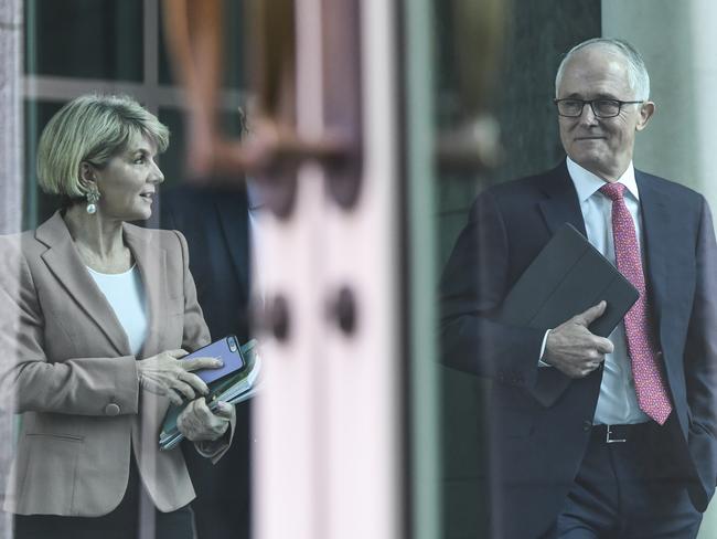 Australian Prime Minister Malcolm Turnbull (right) and Australian Foreign Minister Julie Bishop arrive for a party room meeting at Parliament House in Canberra, Tuesday, August 21, 2018. Malcolm Turnbull declared the leadership position as a vacant. (AAP Image/Lukas Coch) NO ARCHIVING