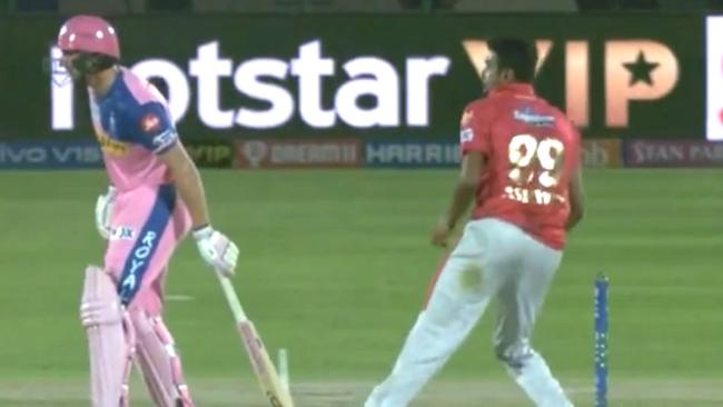 Ravichandran Ashwin prepares to whip the bails off.