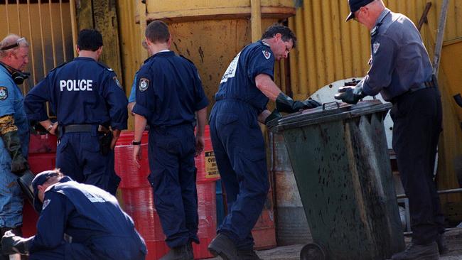 Police and fire brigade officers found Ms Podgoyetsky’s body stuffed in a wheelie bin. Picture: Brad Newman