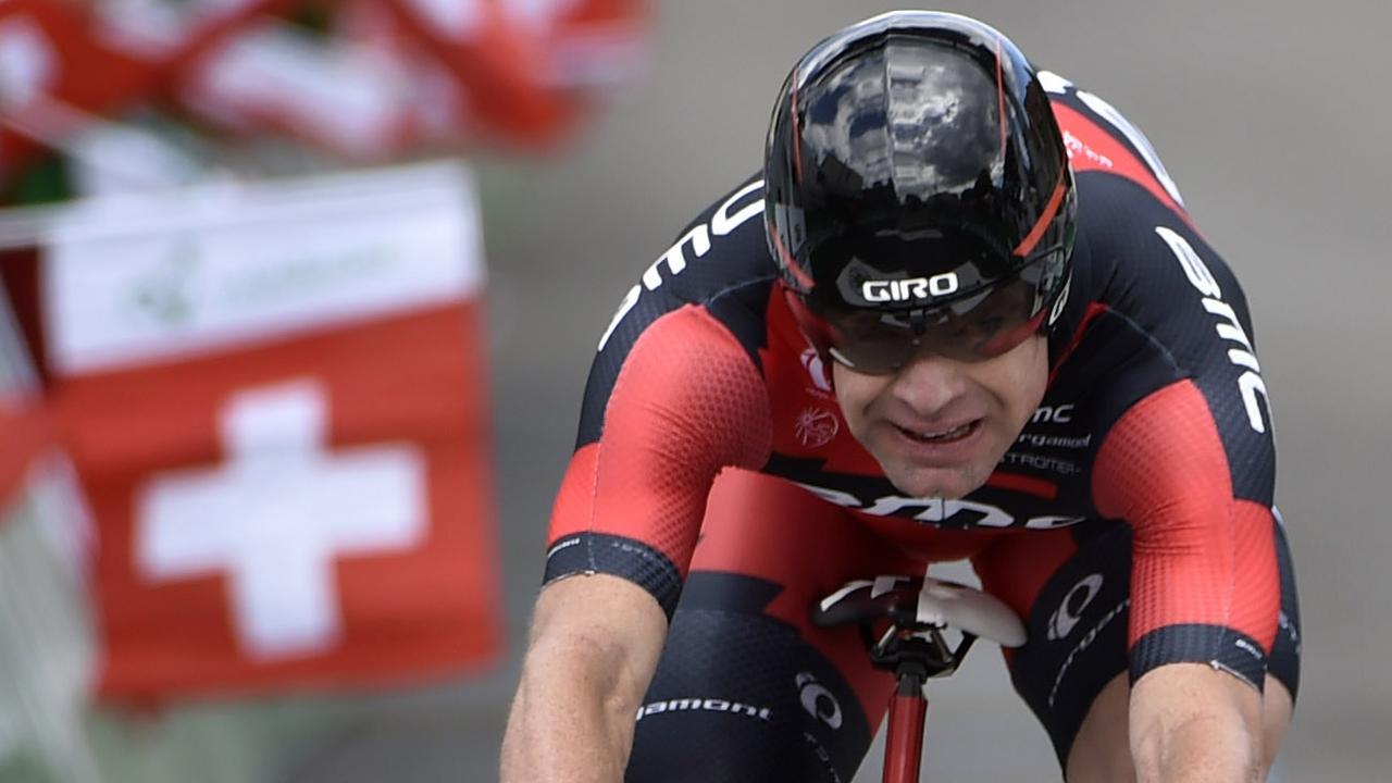 Australia's Cadel Evans of team BMC Racing crosses the finish line during the 7th stage, a 24,5 km race against the clock from Worb to Worb, at the 78th Tour de Suisse UCI ProTour cycling race, in Worb, Switzerland, Friday, June 20, 2014. (AP Photo/Keystone,Peter Schneider)