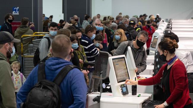 Melbourne Airport this week. Victorian families have been left scrambling to get home from ruined school holidays interstate. Picture: Tony Gough