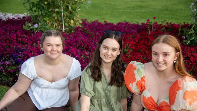 Kaylee Richters (left) with Georgie Schilf and Maggie Brunner in Laurel Bank Park for the Carnival of Flowers, Sunday, September 22, 2024. Picture: Bev Lacey