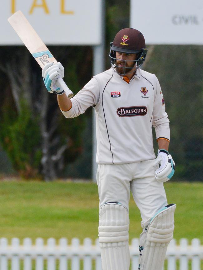 Alex Ross salutes after reaching 50. Picture: AAP/Brenton Edwards