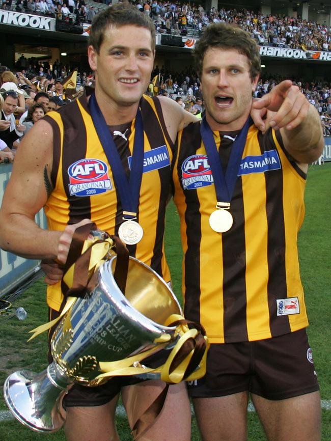 Trent Craod with Hawthorn teammate Campbell Brown after winning the 2008 Grand Final.