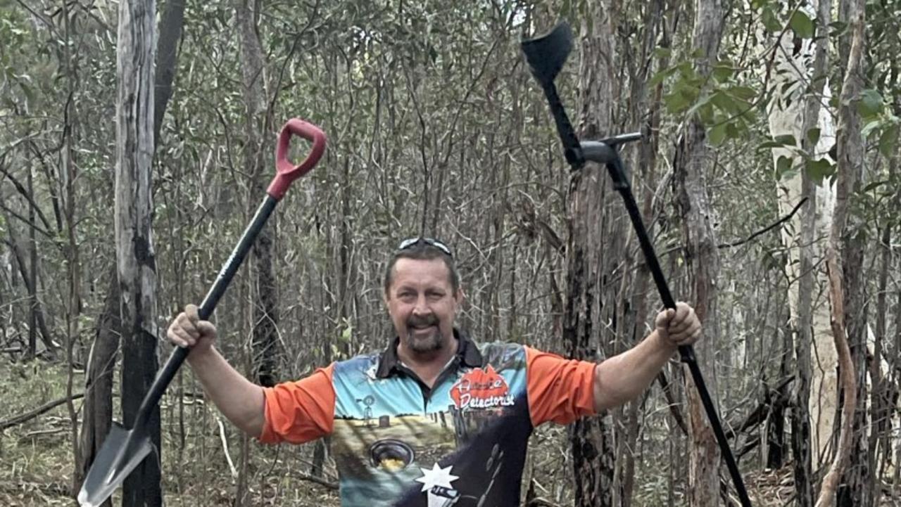 Brisbane’s Fred Wimmer with his trusty spade and metal detector, at the site of his historic discovery.