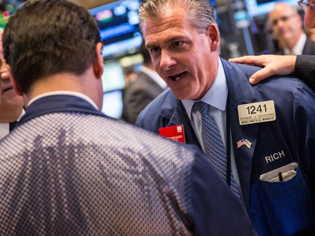 NEW YORK, NY - SEPTEMBER 02: Traders work on the floor of the New York Stock Exchange during the afternoon of September 2, 2015 in New York City. After three days of losses the market closed nearly 300 points up this afternoon. Andrew Burton/Getty Images/AFP == FOR NEWSPAPERS, INTERNET, TELCOS & TELEVISION USE ONLY ==