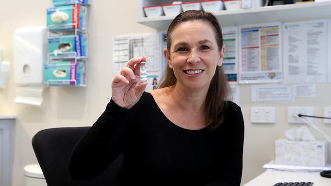 GP Nicole Fogarty with a vial of AstraZeneca vaccine, ahead of the Phase 1B rollout starting on Monday at her Double Bay practice in Sydney. Picture: Jane Dempster