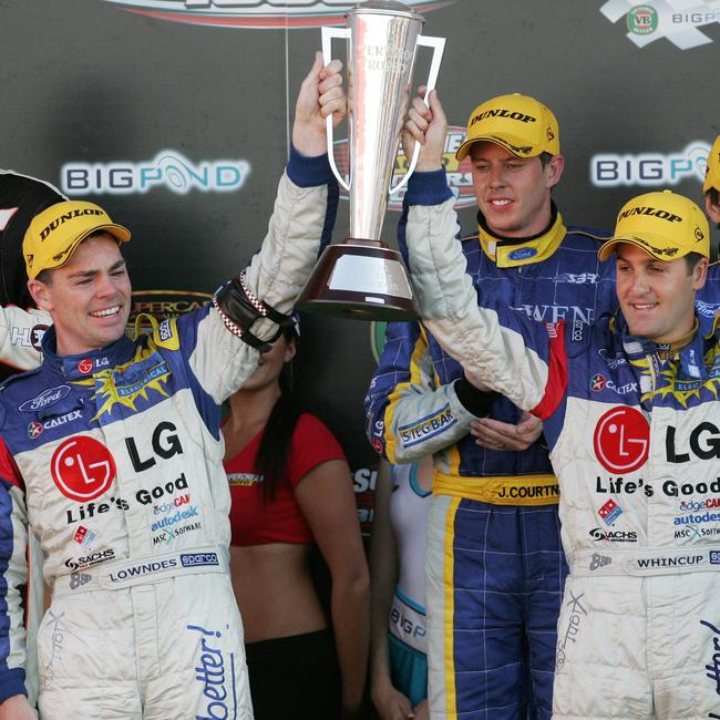 Craig Lowndes with Jamie Whincup holding Peter Brock Trophy in 2006.