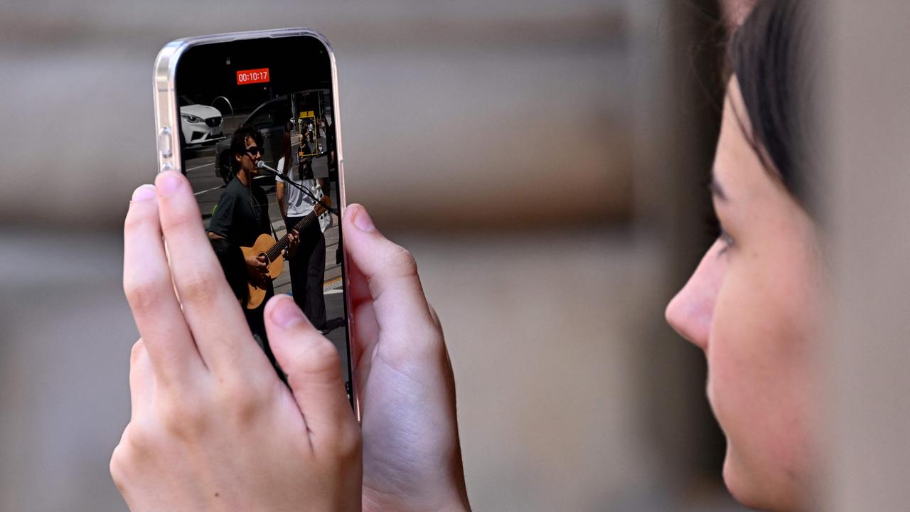 The reforms will help to address cyber-bullying and the harmful effects of being bombarded by negative images. Picture: William WEST / AFP