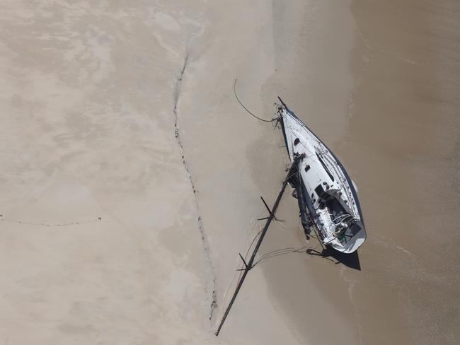 Tasmanian-owned yacht, the Huntress, washed up on Cape Barren Island on January 4 after being adrift at sea for several days when it was damaged during the 2022 Sydney to Hobart yacht race. Pic was taken January 5. Picture; Aboriginal Land Council Tasmania.