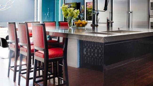 The beautiful red stools in the kitchen.