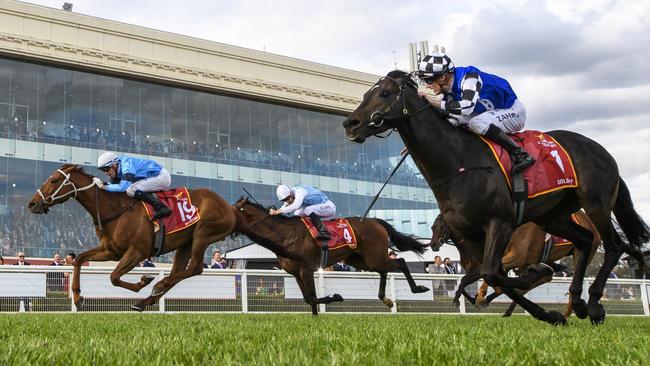 Michael Dee riding Durston (L) defeats Mark Zahra and Gold Trip (r) in this year’s Caulfield Cup in Melbourne. Picture: Vince Caligiuri / Getty Images