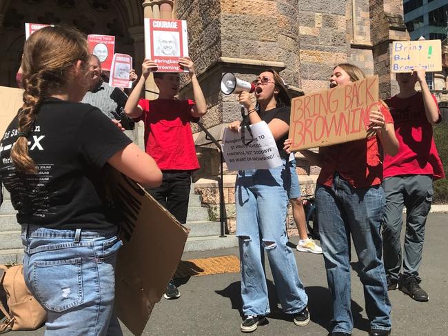 Parents and students from St Paul's School protest the removal of principal Paul Browning at the Anglican Cathedral in Brisbane's CBD. Picture: Liam Cook