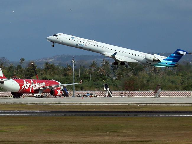 Garuda indonesia aircraft take off from Ngurah Rai International Airport on saturday. The Airport reopens on saturday after temporary closure since thursday night due to volcanic ash of Mount Raung.