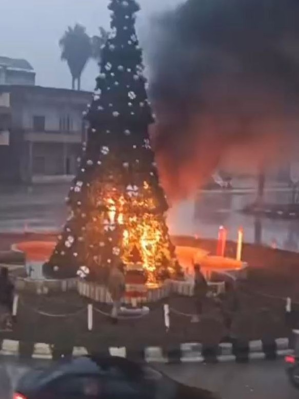 The Christmas tree was set on fire by Islamists in central Syria.