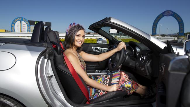 Mercedes-Benz Gold Coast are  taking the naming rights for this year's Melbourne Cup at The Gold Coast Turf Club. Tash Pappas with a new Mercedes-Benz SLC300. Photo: Jerad Williams