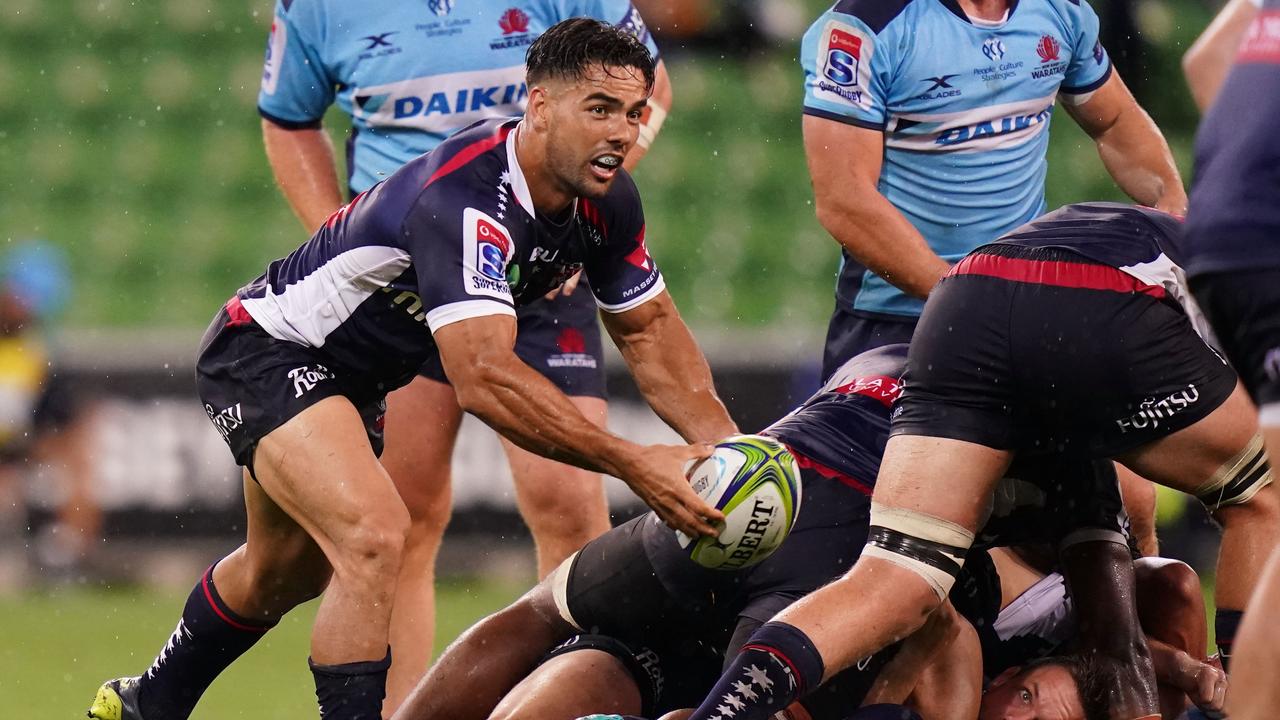 Ryan Louwrens of the Rebels passes the ball at AAMI Park in Melbourne.