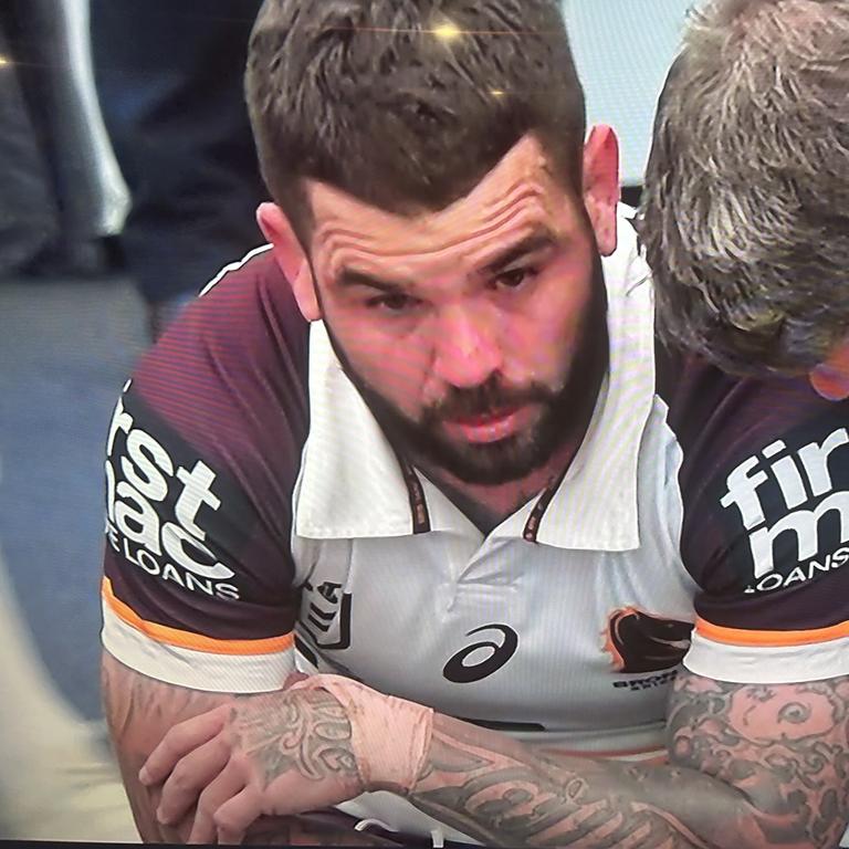 Broncos skipper Adam Reynolds in tears at halftime of the match against the Storm after succumbing to a knee injury.