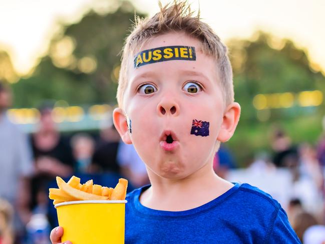 Cute Australian boy with flag tattoo on his face on Australia Day celebration in Adelaide Generic Australia Day iStock