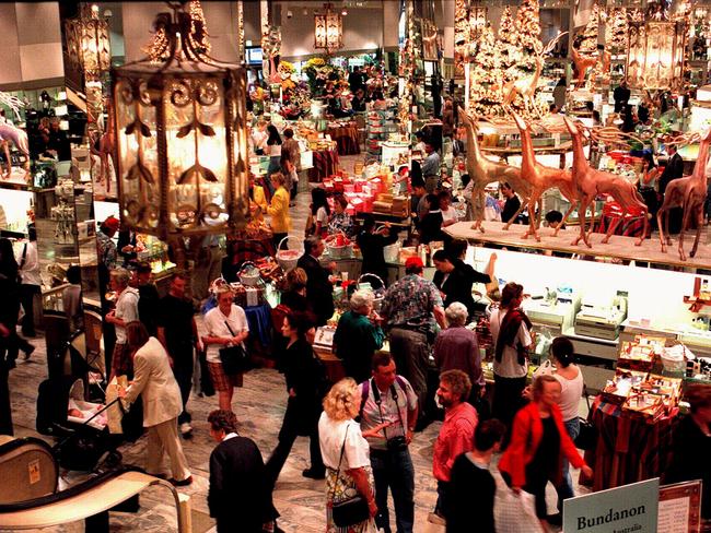 By the mid-’90s, late night shopping and even 24-hour trade was common. Here, Christmas shoppers pack David Jones in Bourke Street in 1996. Picture: HWT Library