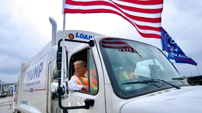 Donald Trump pulls up in a garbage truck at Austin Straubel International Airport in Green Bay, Wisconsin. Picture: X