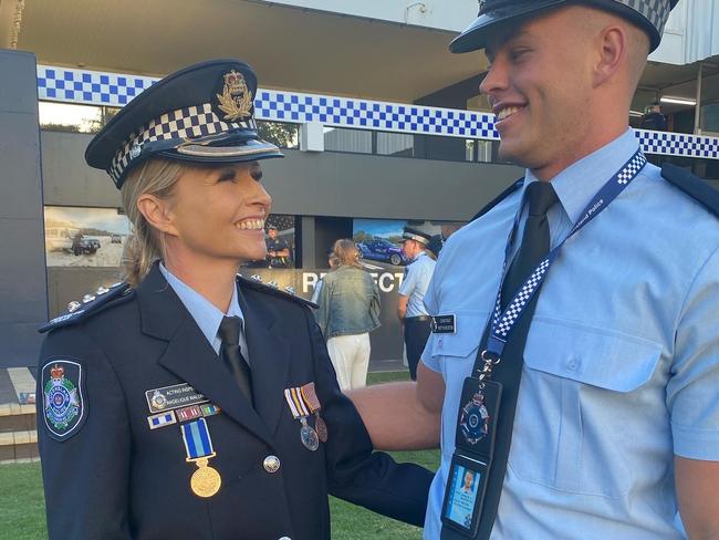 Senior Sergeant Angelique Maloney with son Matt Munckton after he was inducted into the ranks of the Queensland Police Academy