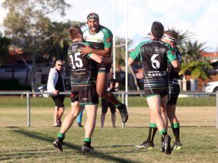 Rugby League Gold Coast (RLGC) A Grade clash between Helensvale Hornets (Green/Yellow) and Southport Tigers (Orange).Brent Barnes scoring.20 June 2021 Helensvale Picture by Richard Gosling