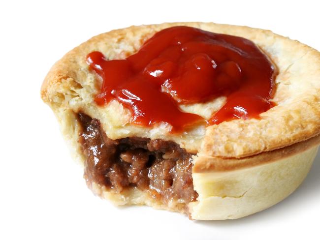 Australian meat pie and tomato sauce.