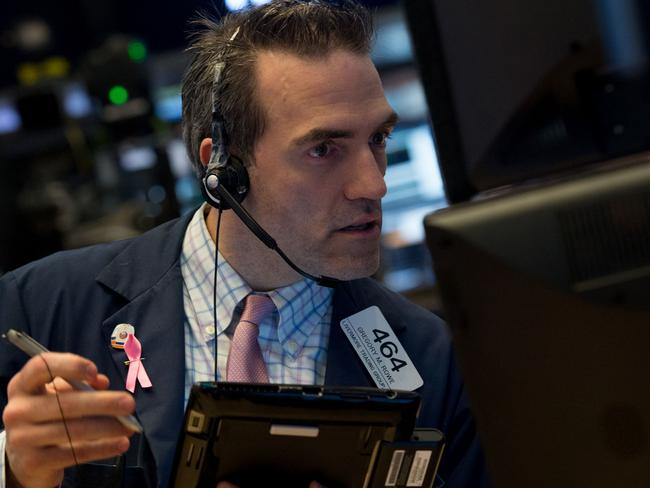 A trader works on the floor of the New York Stock Exchange. Picture: AFP